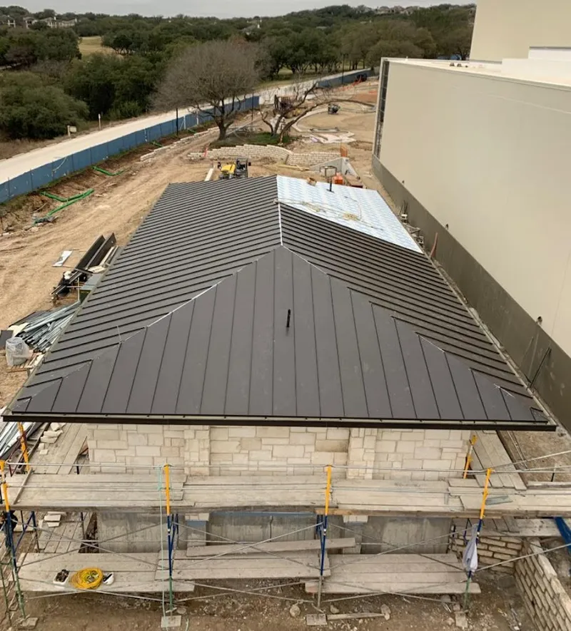 Metal roof new construction with scaffolding in Odenton